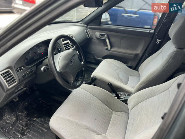 Зелений ВАЗ 2110, об'ємом двигуна 1.6 л та пробігом 100 тис. км за 1400 $, фото 12 на Automoto.ua