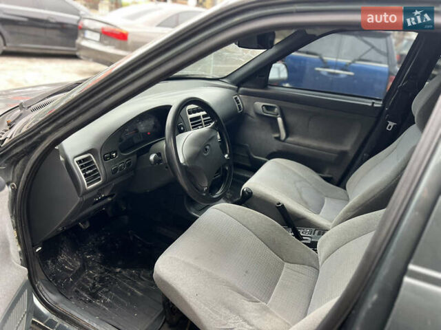 Зелений ВАЗ 2110, об'ємом двигуна 1.6 л та пробігом 100 тис. км за 1400 $, фото 13 на Automoto.ua