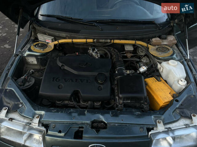 Зелений ВАЗ 2110, об'ємом двигуна 1.6 л та пробігом 165 тис. км за 2300 $, фото 14 на Automoto.ua