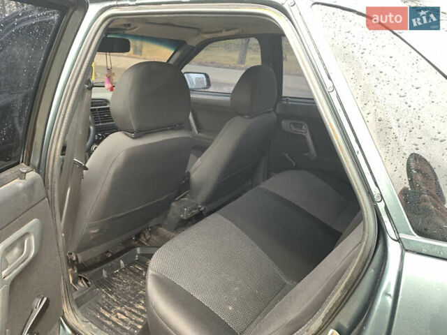 Зеленый ВАЗ 2110, объемом двигателя 1.6 л и пробегом 213 тыс. км за 2750 $, фото 4 на Automoto.ua