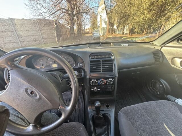 Чорний ВАЗ 21106, об'ємом двигуна 1.6 л та пробігом 77 тис. км за 1250 $, фото 6 на Automoto.ua