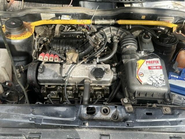 Черный ВАЗ 2111, объемом двигателя 1.6 л и пробегом 180 тыс. км за 999 $, фото 4 на Automoto.ua