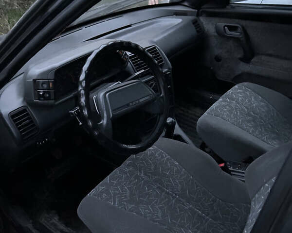Чорний ВАЗ 2111, об'ємом двигуна 1.5 л та пробігом 219 тис. км за 700 $, фото 5 на Automoto.ua