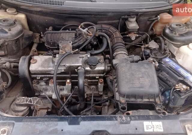 Черный ВАЗ 2111, объемом двигателя 1.6 л и пробегом 357 тыс. км за 1350 $, фото 2 на Automoto.ua