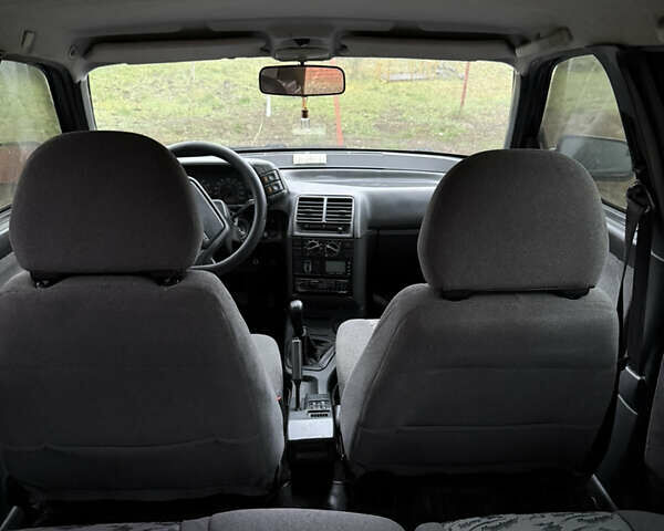 Черный ВАЗ 2111, объемом двигателя 1.6 л и пробегом 180 тыс. км за 2000 $, фото 1 на Automoto.ua