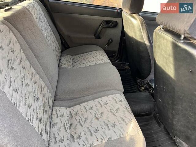 Черный ВАЗ 2111, объемом двигателя 1.6 л и пробегом 258 тыс. км за 1500 $, фото 4 на Automoto.ua