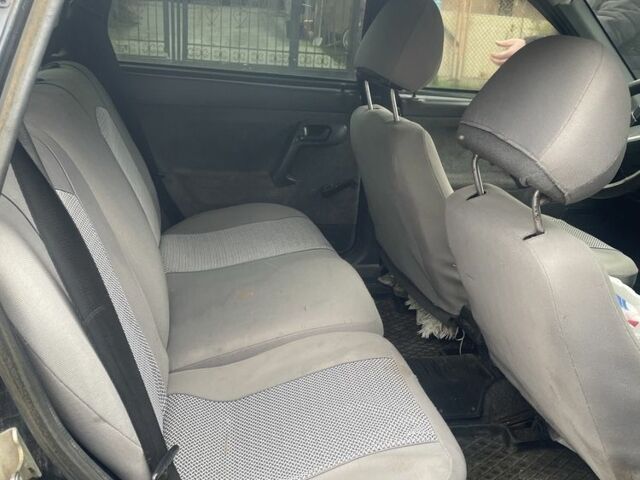 Черный ВАЗ 2111, объемом двигателя 1.6 л и пробегом 380 тыс. км за 1000 $, фото 3 на Automoto.ua