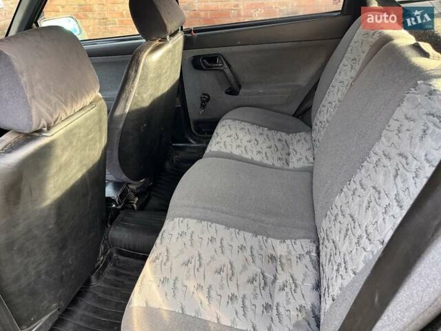 Черный ВАЗ 2111, объемом двигателя 1.6 л и пробегом 258 тыс. км за 1500 $, фото 11 на Automoto.ua