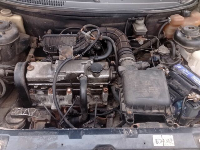 Черный ВАЗ 2111, объемом двигателя 1.6 л и пробегом 357 тыс. км за 1350 $, фото 3 на Automoto.ua