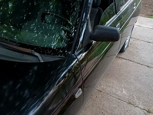 Черный ВАЗ 2111, объемом двигателя 1.6 л и пробегом 107 тыс. км за 1800 $, фото 4 на Automoto.ua