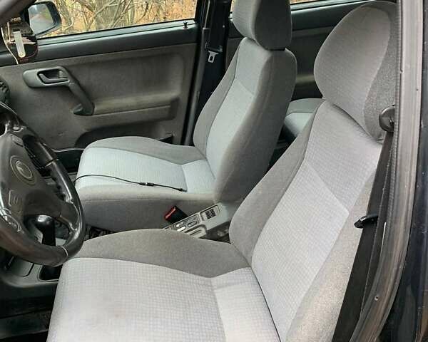 Черный ВАЗ 2111, объемом двигателя 1.6 л и пробегом 296 тыс. км за 1500 $, фото 6 на Automoto.ua