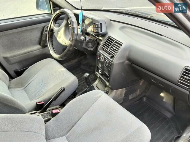 Черный ВАЗ 2111, объемом двигателя 1.6 л и пробегом 314 тыс. км за 1700 $, фото 18 на Automoto.ua