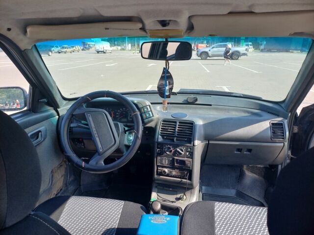 Черный ВАЗ 2111, объемом двигателя 1.5 л и пробегом 213 тыс. км за 1500 $, фото 5 на Automoto.ua