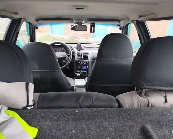 Черный ВАЗ 2111, объемом двигателя 1.6 л и пробегом 155 тыс. км за 2800 $, фото 4 на Automoto.ua