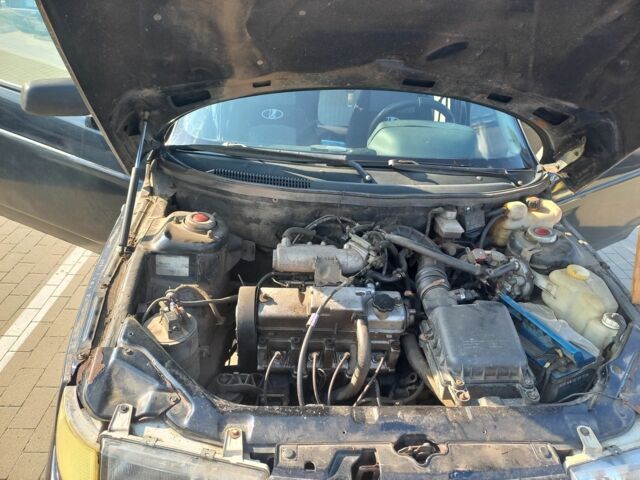 Черный ВАЗ 2111, объемом двигателя 1.5 л и пробегом 213 тыс. км за 1500 $, фото 11 на Automoto.ua