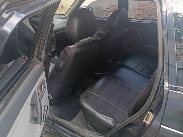 Черный ВАЗ 2111, объемом двигателя 1.6 л и пробегом 206 тыс. км за 1700 $, фото 4 на Automoto.ua