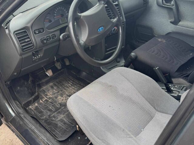 Черный ВАЗ 2111, объемом двигателя 1.5 л и пробегом 251 тыс. км за 850 $, фото 10 на Automoto.ua