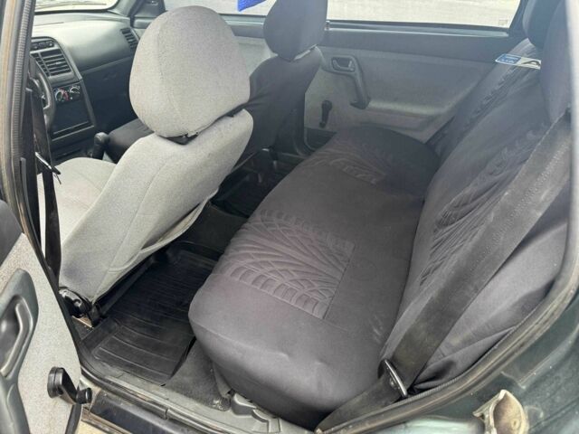 Черный ВАЗ 2111, объемом двигателя 1.5 л и пробегом 251 тыс. км за 850 $, фото 4 на Automoto.ua