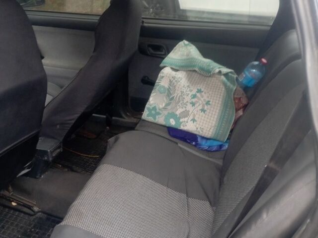 Черный ВАЗ 2111, объемом двигателя 1.6 л и пробегом 171 тыс. км за 1900 $, фото 6 на Automoto.ua