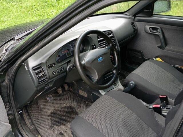 Черный ВАЗ 2111, объемом двигателя 1.6 л и пробегом 228 тыс. км за 1500 $, фото 7 на Automoto.ua