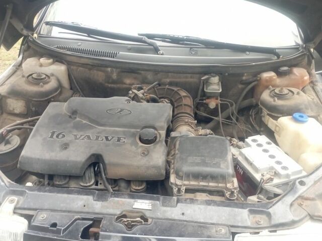 Черный ВАЗ 2111, объемом двигателя 1.6 л и пробегом 171 тыс. км за 1900 $, фото 7 на Automoto.ua