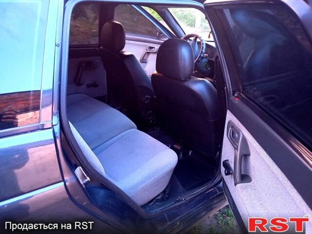 Черный ВАЗ 2111, объемом двигателя 1.6 л и пробегом 270 тыс. км за 2050 $, фото 7 на Automoto.ua