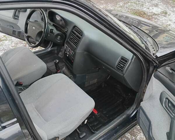 Черный ВАЗ 2111, объемом двигателя 1.6 л и пробегом 162 тыс. км за 3000 $, фото 11 на Automoto.ua