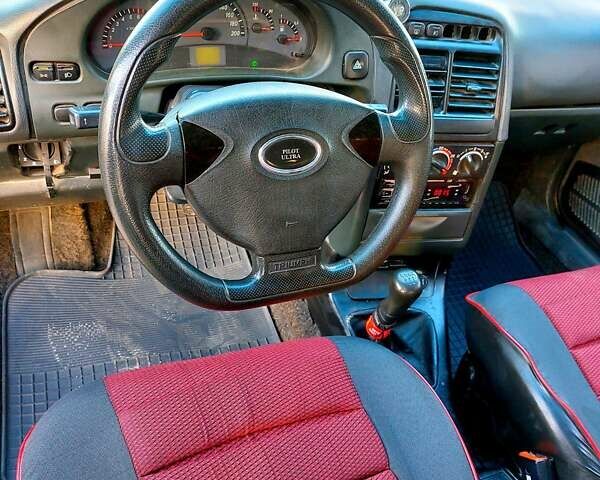 ВАЗ 2111 2008 в Тростянец на Automoto.ua Черный ВАЗ 2111, объемом двигателя 1.6 л и пробегом 90 тыс. км за 2100 $, фото 16 на Automoto.ua