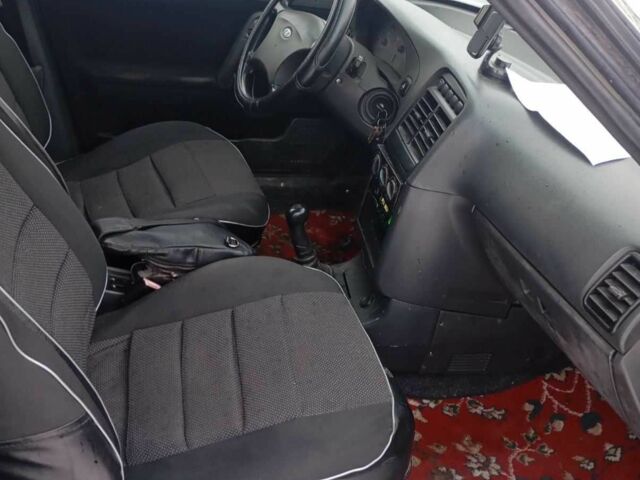 Чорний ВАЗ 2111, об'ємом двигуна 1.6 л та пробігом 1 тис. км за 1306 $, фото 4 на Automoto.ua