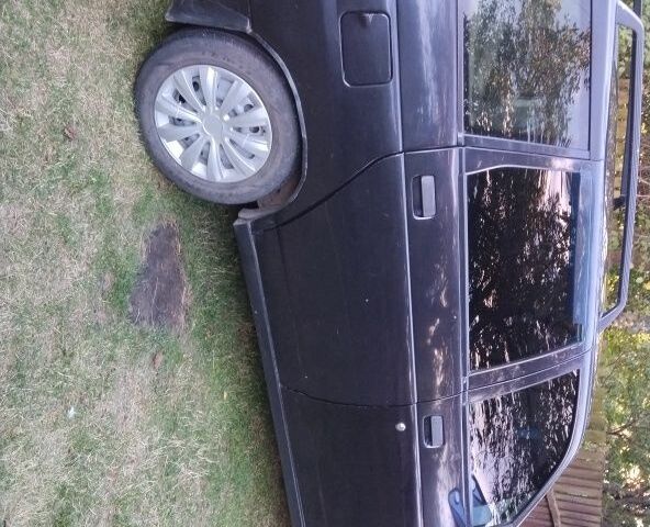 Черный ВАЗ 2111, объемом двигателя 1 л и пробегом 170 тыс. км за 1900 $, фото 2 на Automoto.ua