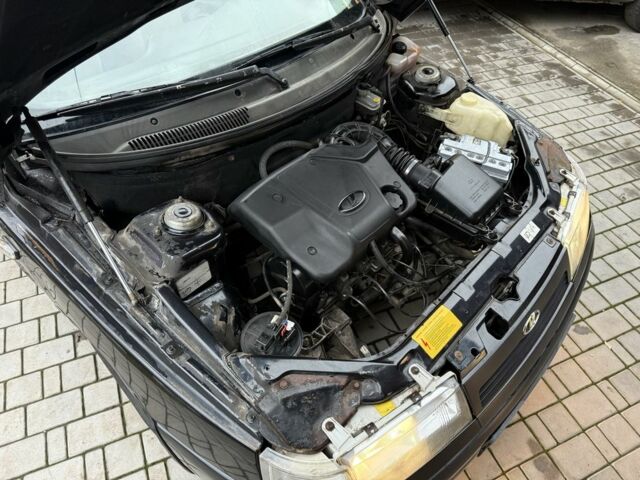 Черный ВАЗ 2111, объемом двигателя 1.6 л и пробегом 179 тыс. км за 1250 $, фото 9 на Automoto.ua