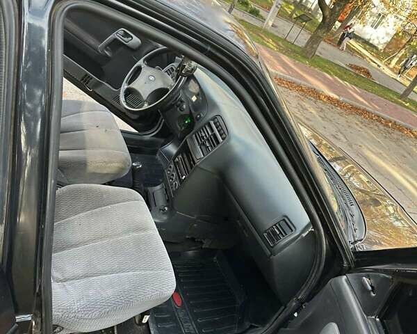 Черный ВАЗ 2111, объемом двигателя 1.6 л и пробегом 250 тыс. км за 1850 $, фото 5 на Automoto.ua