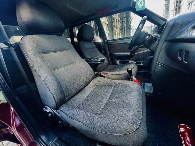 Красный ВАЗ 2111, объемом двигателя 1.5 л и пробегом 280 тыс. км за 1450 $, фото 6 на Automoto.ua