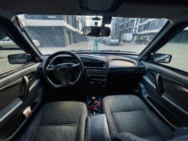 Красный ВАЗ 2111, объемом двигателя 1.5 л и пробегом 280 тыс. км за 1450 $, фото 7 на Automoto.ua