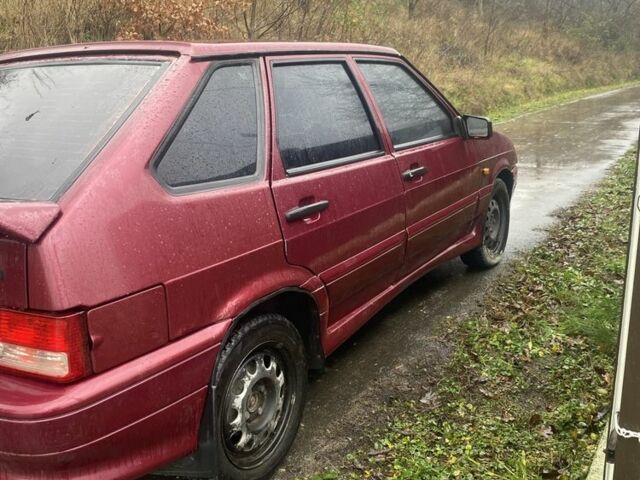 Красный ВАЗ 2111, объемом двигателя 1.5 л и пробегом 186 тыс. км за 600 $, фото 4 на Automoto.ua