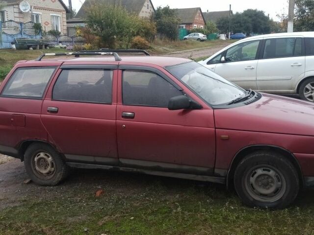 Красный ВАЗ 2111, объемом двигателя 1.5 л и пробегом 344 тыс. км за 1300 $, фото 1 на Automoto.ua