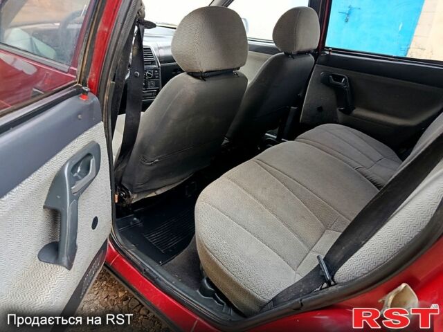 Красный ВАЗ 2111, объемом двигателя 1.5 л и пробегом 180 тыс. км за 1650 $, фото 5 на Automoto.ua