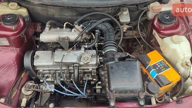 Красный ВАЗ 2111, объемом двигателя 1.5 л и пробегом 255 тыс. км за 2400 $, фото 2 на Automoto.ua