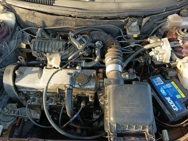 Красный ВАЗ 2111, объемом двигателя 1.6 л и пробегом 150 тыс. км за 1307 $, фото 7 на Automoto.ua