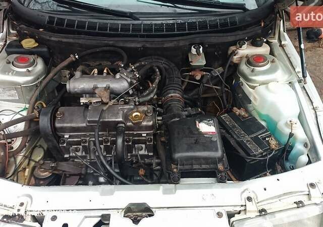 Серый ВАЗ 2111, объемом двигателя 1.5 л и пробегом 250 тыс. км за 1500 $, фото 3 на Automoto.ua