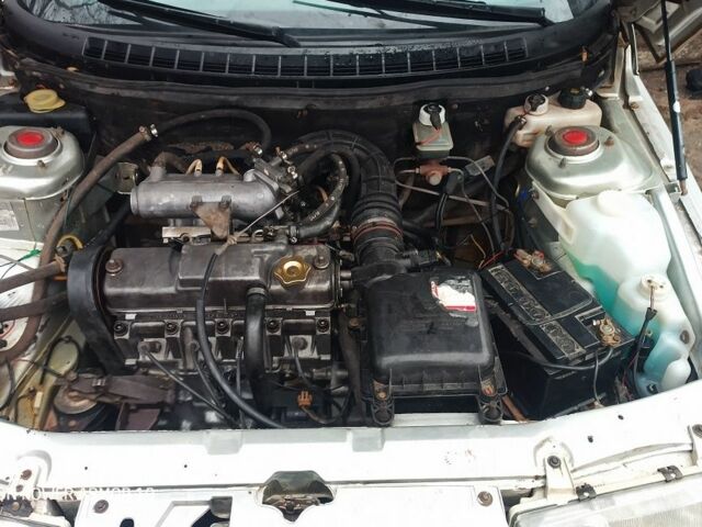 Серый ВАЗ 2111, объемом двигателя 1.5 л и пробегом 250 тыс. км за 1500 $, фото 4 на Automoto.ua