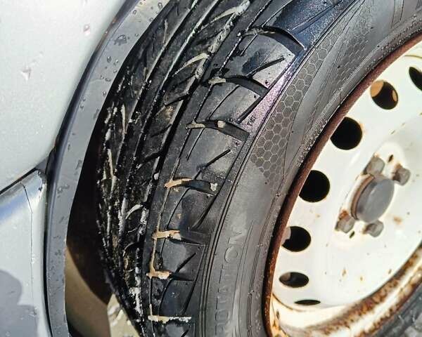 Серый ВАЗ 2111, объемом двигателя 1.5 л и пробегом 224 тыс. км за 1500 $, фото 5 на Automoto.ua