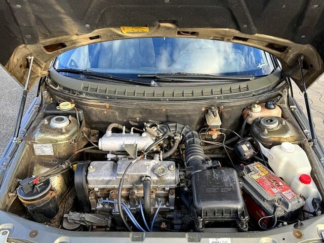 Серый ВАЗ 2111, объемом двигателя 1.5 л и пробегом 325 тыс. км за 1750 $, фото 8 на Automoto.ua