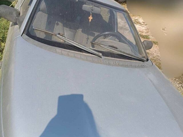 Серый ВАЗ 2111, объемом двигателя 1.6 л и пробегом 200 тыс. км за 1000 $, фото 1 на Automoto.ua