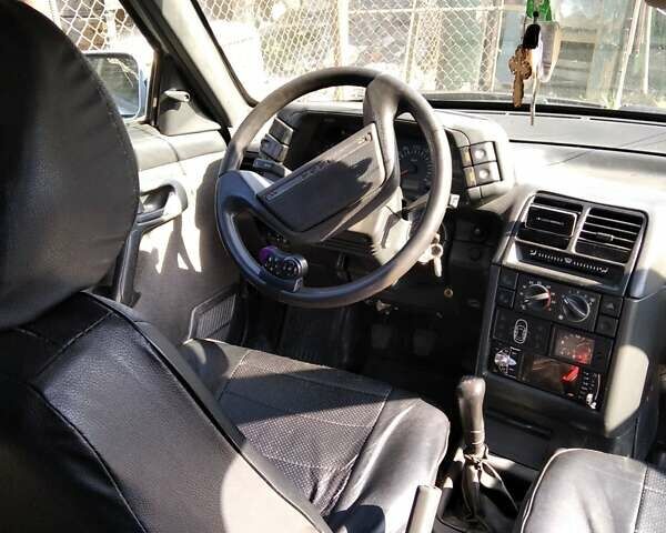 Серый ВАЗ 2111, объемом двигателя 1.5 л и пробегом 300 тыс. км за 1438 $, фото 4 на Automoto.ua