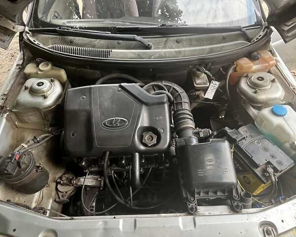 Серый ВАЗ 2111, объемом двигателя 1.6 л и пробегом 210 тыс. км за 1200 $, фото 14 на Automoto.ua