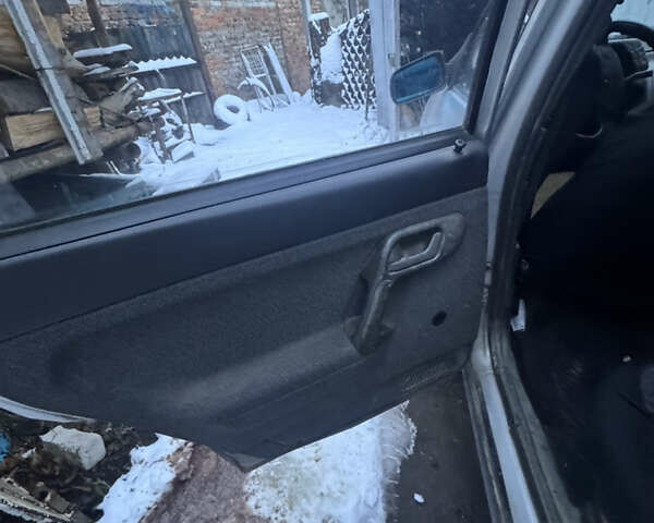 Серый ВАЗ 2111, объемом двигателя 1.6 л и пробегом 230 тыс. км за 1000 $, фото 4 на Automoto.ua