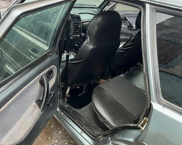 Серый ВАЗ 2111, объемом двигателя 1.6 л и пробегом 242 тыс. км за 1500 $, фото 8 на Automoto.ua