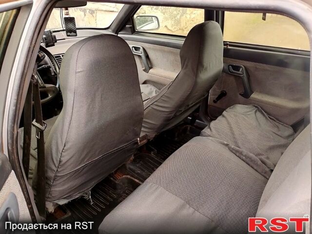 Серый ВАЗ 2111, объемом двигателя 1.6 л и пробегом 320 тыс. км за 1500 $, фото 4 на Automoto.ua