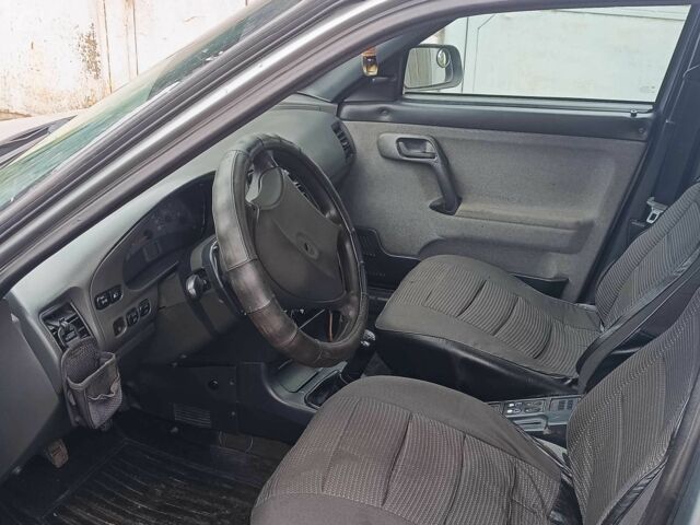 Серый ВАЗ 2111, объемом двигателя 1.6 л и пробегом 135 тыс. км за 2000 $, фото 4 на Automoto.ua